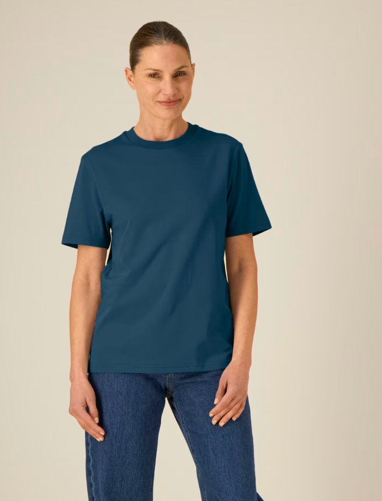 A woman and a man in white organic cotton t-shirts and blue jeans 