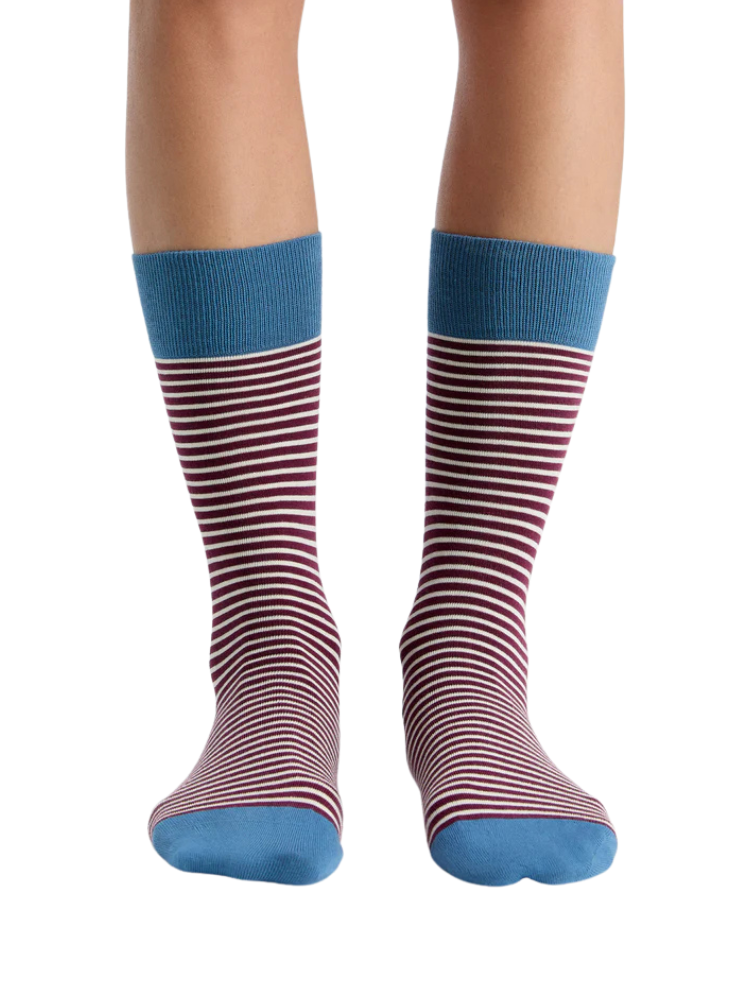red, white and blue stripe organic cotton socks on a grey background