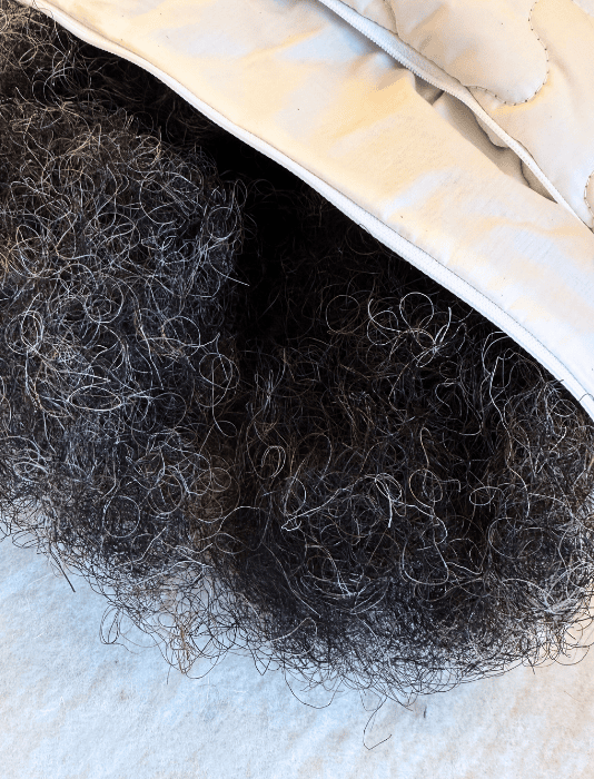 horsehair pillow with undyed natural organic cotton quilted cover with zip opening 