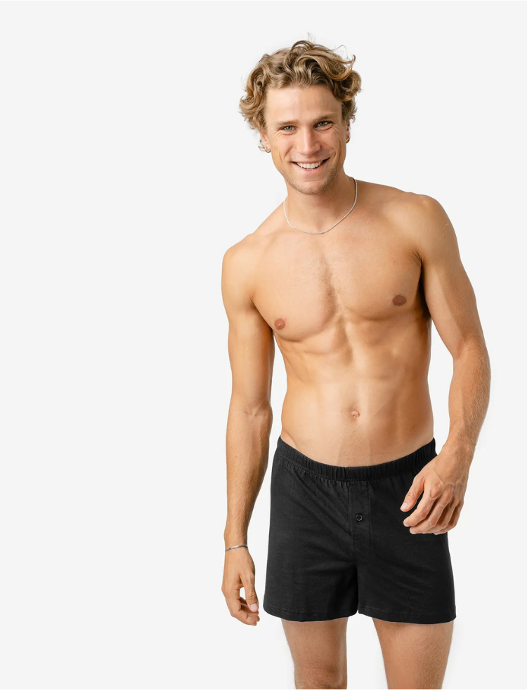 a man is wearing undyed organic cotton boxer shorts 