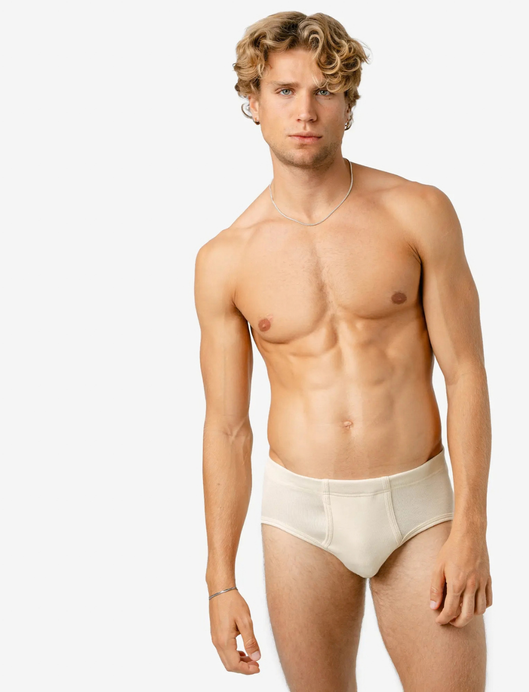A man is wearing undyed organic cotton briefs 