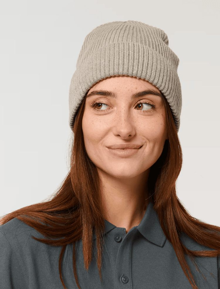 a man wearing an organic cotton rib beanie in oatmeal