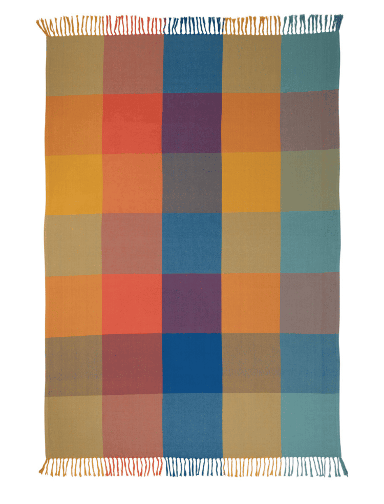 multicolour check organic cotton twill blanket with fringing on a white background 