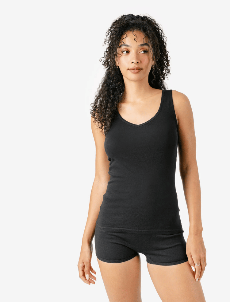 a woman wearing organic non dyed cotton shorts