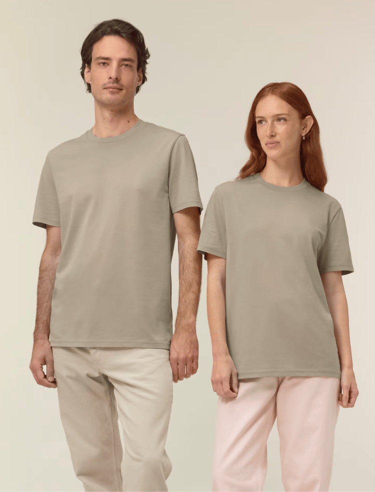 A woman and a man in white organic cotton t-shirts and blue jeans 