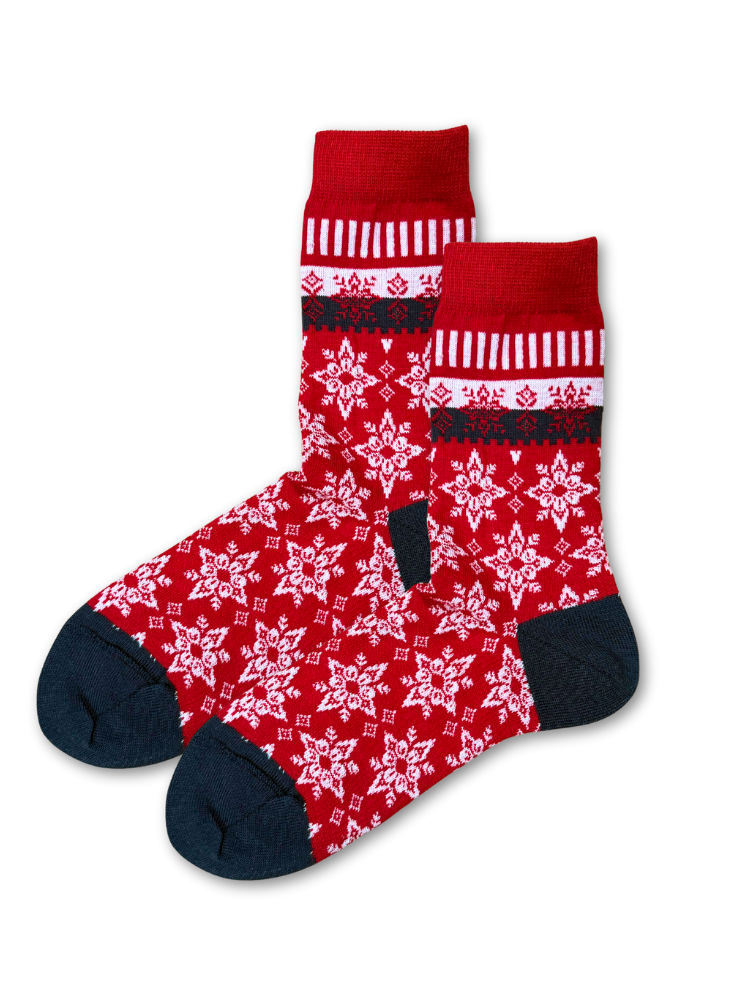 organic wool and cotton socks, red with nordic style snowflake design and black toe and heel lying flat on a white background 