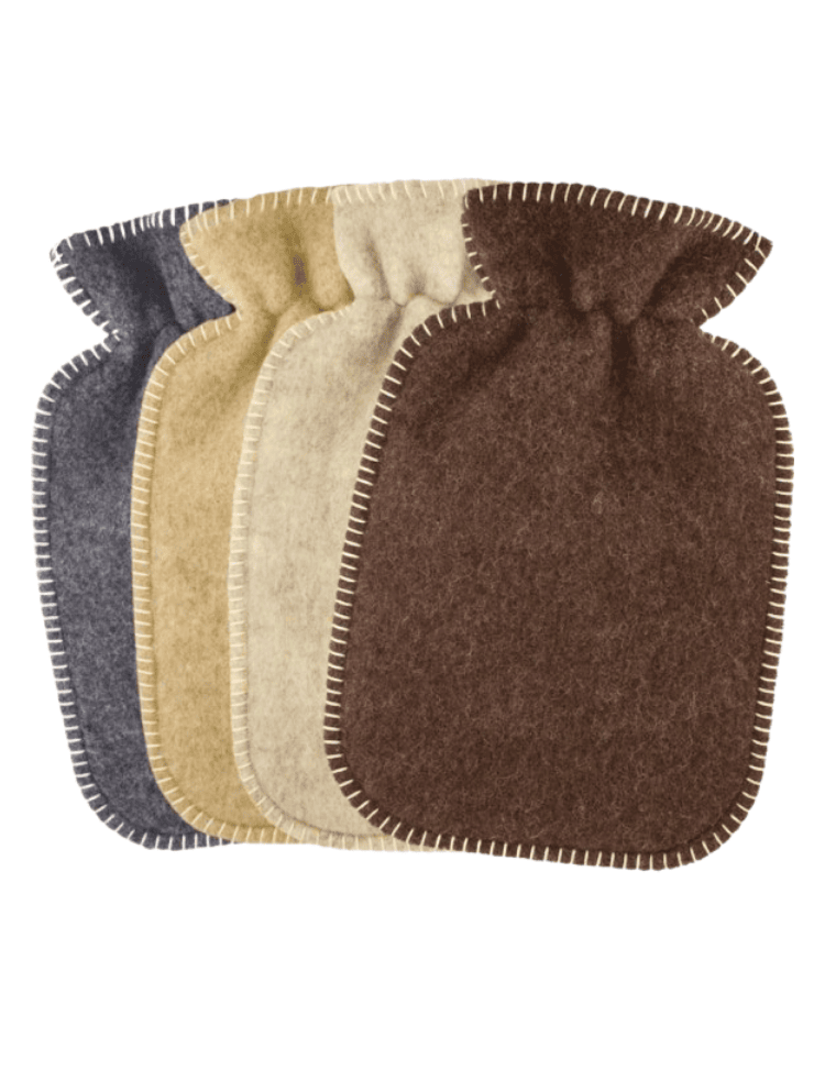 a stack of 4 pure wool hot water bottle covers with blanket stich around the edges.