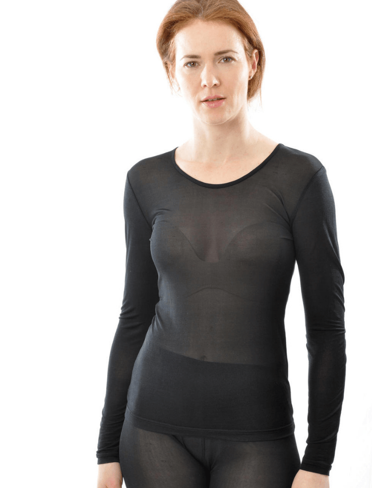 a woman is wearing black organic long sleeve vest 