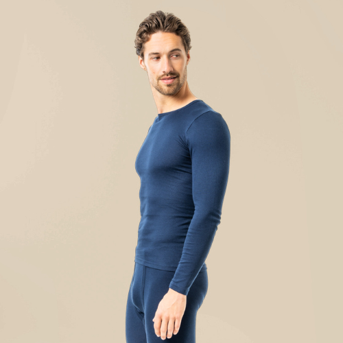 A man is wearing dark blue organic base layers