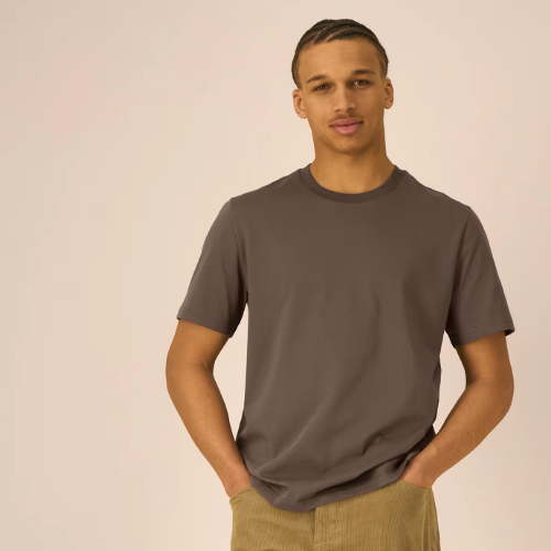 A man is wearing a mocha organic cotton t-shirt