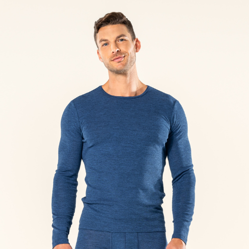 a man is wearing organic wool & silk base layers